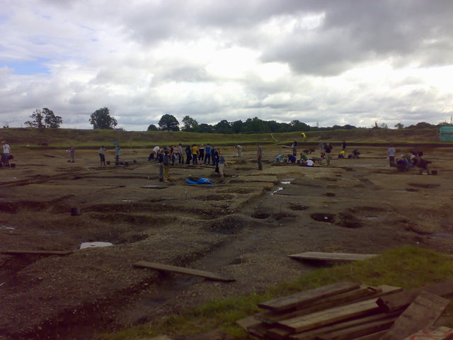 Students cleaning up the site.